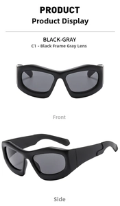 Detail view of chunky black wrap-around Y2K sunglasses with grey lenses and thick frame