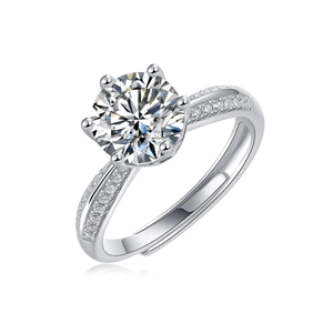 Macro shot of 925 silver ring featuring a sparkling moissanite stone and six-prong setting