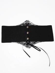 Detail of wide elastic lace corset belt with gold snap buttons and decorative criss-cross ties