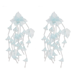 Elegant light blue acrylic flower leaf tassel earrings with a bohemian resort style design