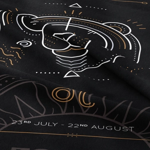 Detail of Leo zodiac tapestry showing golden lion art and 23rd July to 22nd August dates