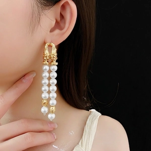 Vintage gold layered pearl tassel drop earrings with luxurious geometric metal design