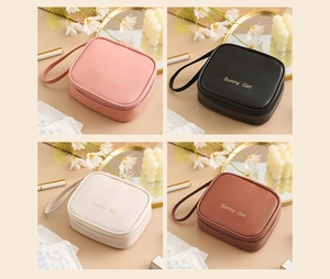 Waterproof PU leather storage bags in pink black white and brown colors with handles