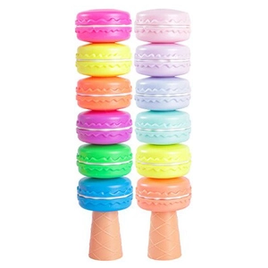 Close-up of colorful macaron-shaped stackable highlighter pens with cone base
