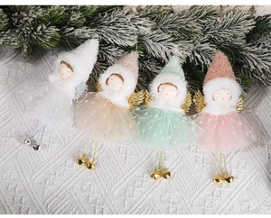 Set of four plush Christmas angel ornaments with mesh skirts and golden wings on knit