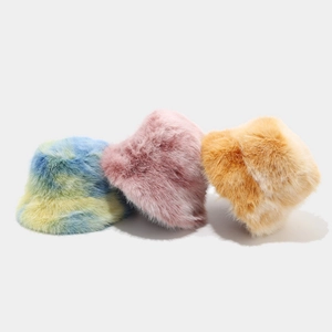 Colorful tie-dye faux fur bucket hat for women in blue, pink, and yellow options