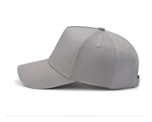 Side view of gray cotton baseball cap with decorative brim stitching and vent holes