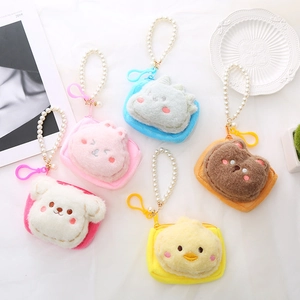 Detail of plush animal coin purses with pearl chains and hooks for school bags