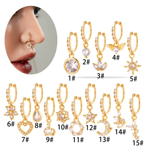 Gold copper nose cuffs with cubic zirconia pendants in butterfly and sunflower shapes