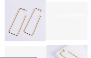 Detailed view of large gold square hoop earrings with minimalist thin metal design