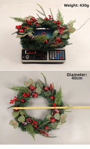 Detail showing 40cm diameter and 430g weight of Christmas wreath with berries
