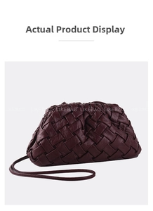 Detail of burgundy pleated woven dumpling bag with magnetic closure and slim leather strap