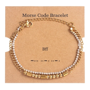 Detail of gold Morse code double-layer bracelet with rhinestones on BFF gift card