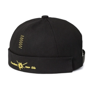 Unisex black canvas Miki Hat with yellow embroidery and Freedom Run Life text detail
