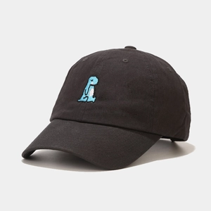 Close-up of blue dinosaur embroidery on black cotton baseball cap with six-panel design
