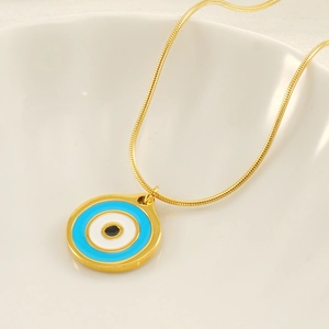 Golden titanium steel snake chain necklace with a blue evil eye pendant for women