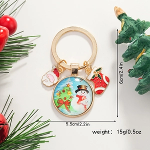 Vue détaillée du porte-clés de Noël en émail avec dimensions et motif bonhomme de neige