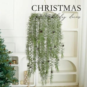 Artificial Christmas hanging garland with pine cones on a clean white background