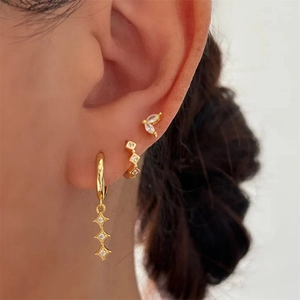 Detailed view of gold S925 sterling silver hoop earrings with detachable zircon pendants