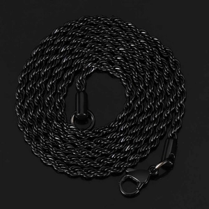 Macro detail of high-quality black twisted rope chain necklace with a lobster clasp closure