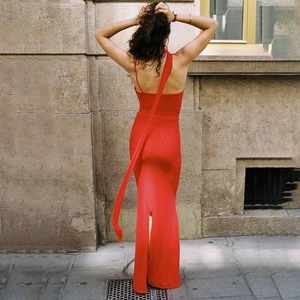 Red backless maxi dress with shoulder streamer and ruching detail for elegant style