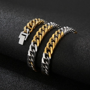 Two-tone silver and gold Cuban link chain bracelet in polished stainless steel for men