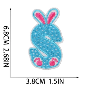 Detail view of Easter bunny S-letter embroidery patch in blue and pink, 6.8cm x 3.8cm