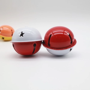 Close-up of 4cm dual-color bells with star cutouts for bags and Christmas decor