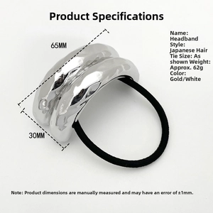 Detailed close-up showing dimensions of metal bow hair tie with wavy silver texture