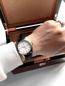 Close-up of Pablo Raez men's quartz watch with silver dial and black leather strap