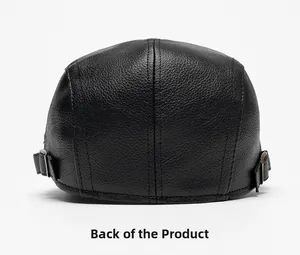 Rear view of black textured leather flat cap showing metal adjustment buckle and neat stitching