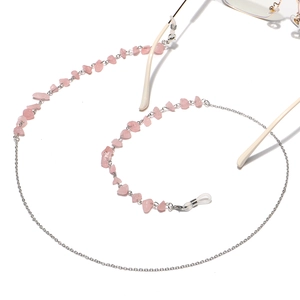 Detail of pink crystal beaded eyewear chain with adjustable clear rubber loops