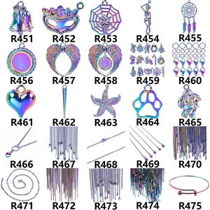 Macro display of rainbow oil slick stainless steel charms and pendant chain jewelry