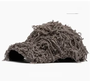 Detailed texture of gray fuzzy plush baseball cap with faux fur finish and flat brim