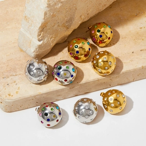 Ball-shaped stainless steel stud earrings with colorful zircon inlays on beige stone