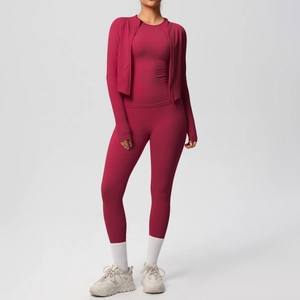 Three-piece yoga set in wine red featuring slim-fit zip jacket and high-waist leggings