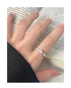 Close-up of S925 sterling silver ring with wrinkled texture and star-shaped zircon