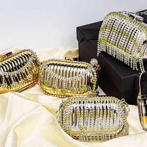 Luxury evening clutch bags with sparkling rhinestones and tassels in gold and silver