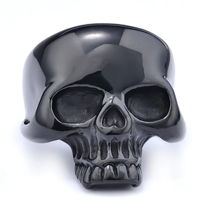 Polished black stainless steel pirate skull ring with realistic anatomical carving details