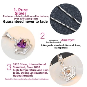 Macro shot of S925 sterling silver crown pendant with heart-shaped purple amethyst stone