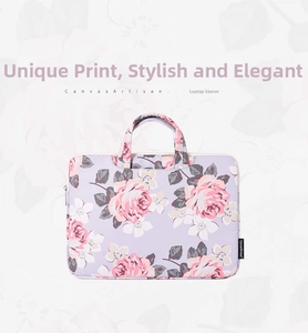 Detail of pink rose pattern on purple laptop sleeve with durable carrying handle