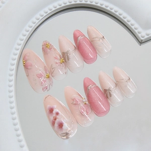Exquisite handmade 3D floral cat eye press-on nails with pearls and pink cherry blossoms