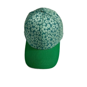 Green baseball cap with floral pattern crown and solid brim for outdoor sun protection