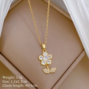 Detail of flower necklace showing 1.1x2.3cm pendant size and 3.3g weight specifications