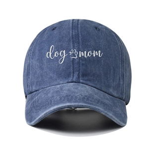 Vintage navy blue cotton baseball cap featuring dog mom text and small paw print logo