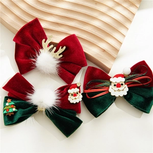 Christmas bow hair clips featuring reindeer antlers, Santa, and tree decor for girls