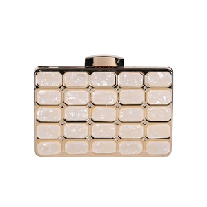 Elegant white acrylic clutch with gold metal clasp and marbled texture finish