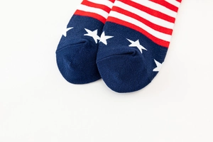 Detailed macro view of the knitted toe area featuring the American flag star and stripe pattern