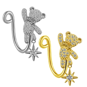 Bear-shaped nose rings in gold and silver with zircon star pendants on a white background