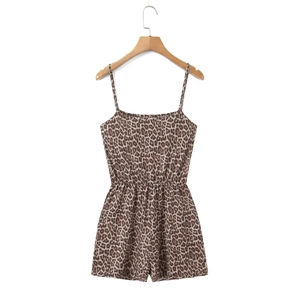 Vintage leopard print spaghetti strap romper with elastic waist shown on a hanger